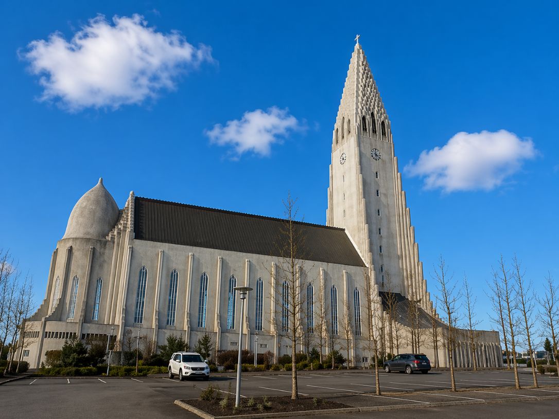 Hallgrimskirkja church in Reykjavik with its iconic tower and modern architecture captured during a Day Trips From Reykjavik tour with our agency