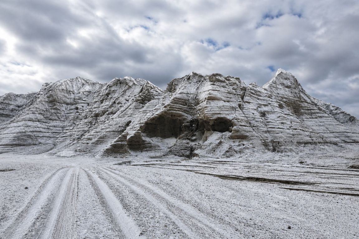 Snow-covered volcanic landscape near Katla Volcano in Iceland with rugged ice formations during a Day Trips From Reykjavik tour with our agency