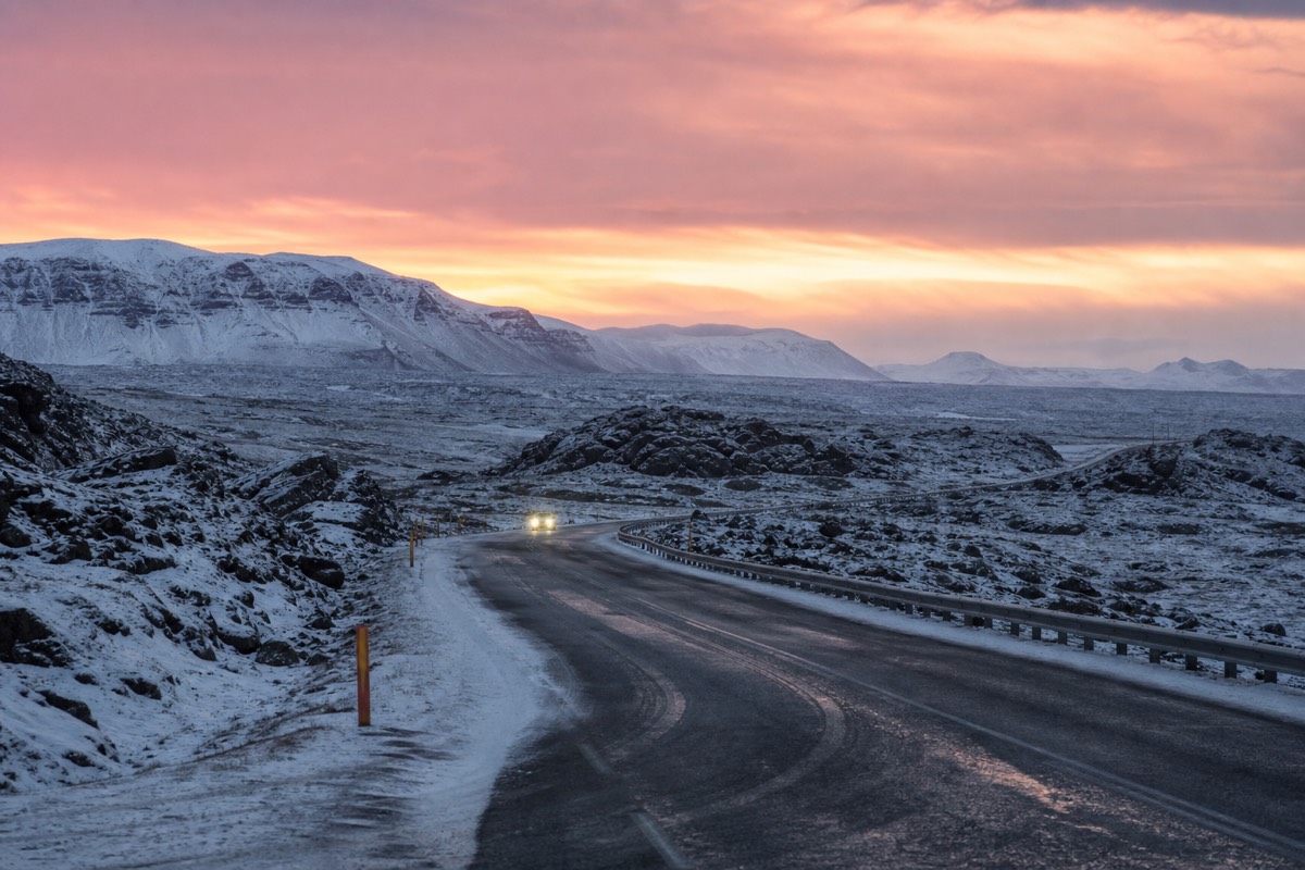 A snow-covered day trip route out of Reykjavik under low winter light