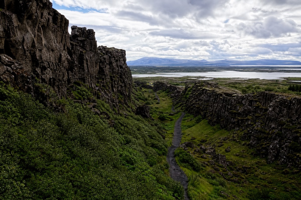 The Almannagja rift path running between high lava walls at Thingvellir National Park